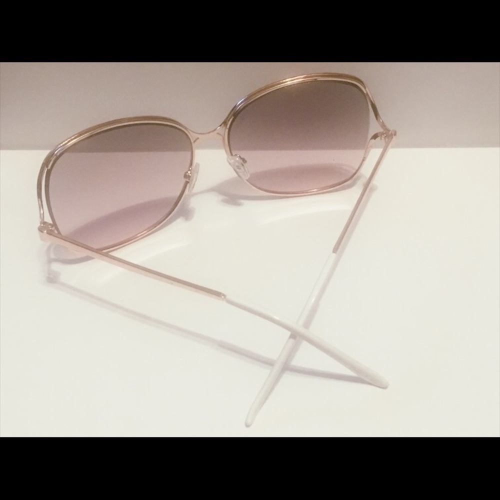 Rose lense gold frame sunglasses